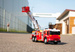 Feuerwehr Ferngesteuertes Feuerwehrauto mit beweglicher Leiter RC Licht/Sound